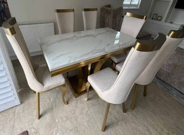 Brushed gold dining table with 6 chairs