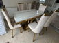 Brushed gold dining table with 6 chairs
